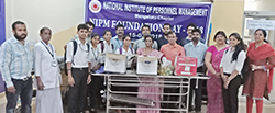 Students collaborate with NIPM for a CSR activity at Wenlock District Hospital, Mangaluru